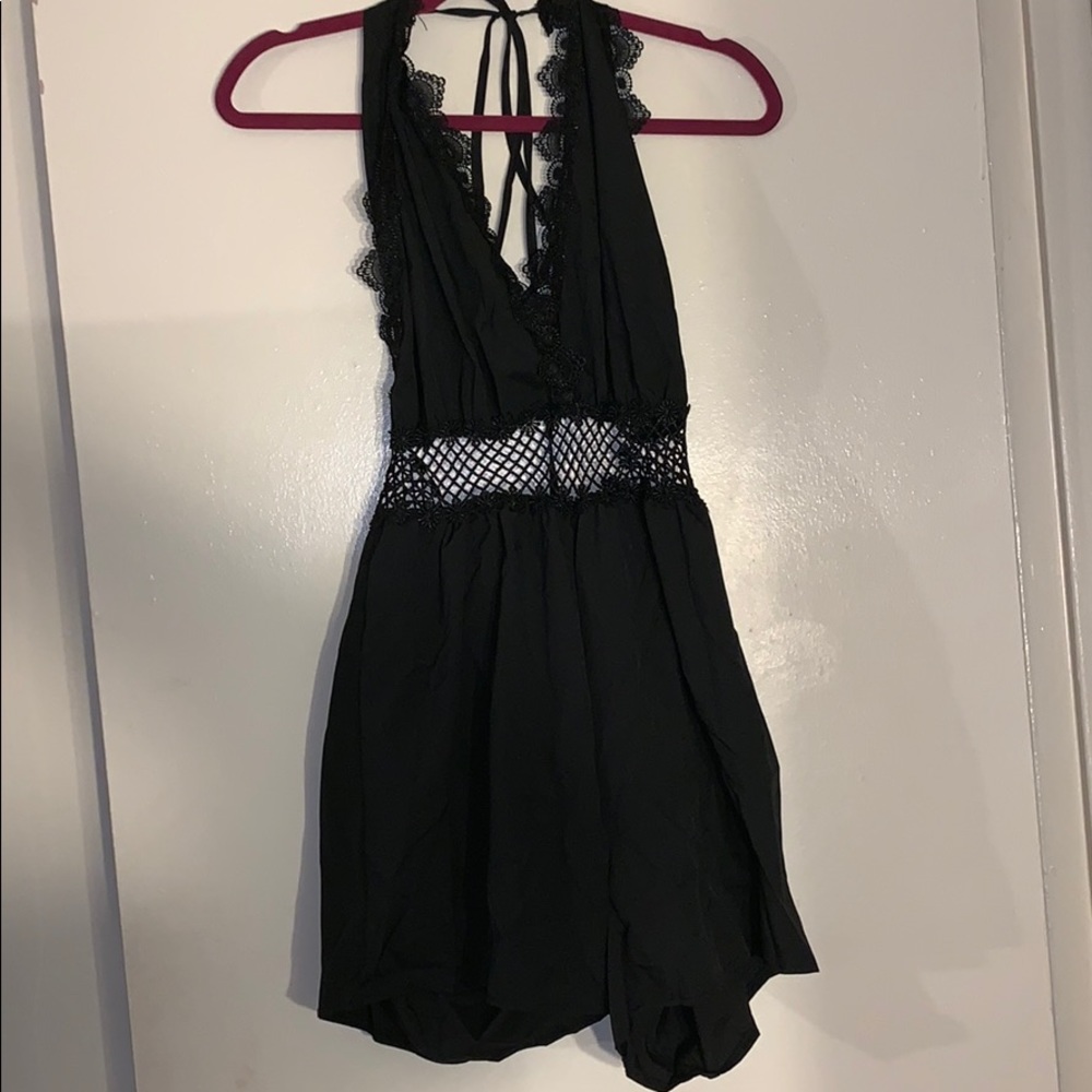 black romper new. never worn, no tags